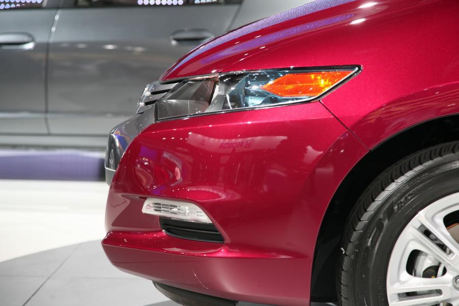  Honda Insight 2010 года  (фото 44 из 84)